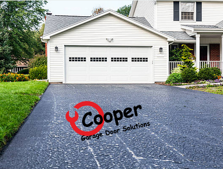 White garage door and driveway on a Palatine, IL home